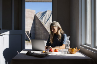 Nightingale Health – Woman on a laptop.
